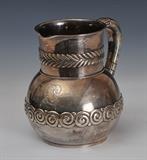 lot 81: Tiffany & Co Sterling Silver Water Pitcher
 7" high 23 troy ounces late 19th century