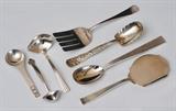 lot 96: Group of Sterling Silver Serving Pieces
 including Georg Jensen (2), Cartier (1), Buccellati (2), Tiffany Vine Pattern serving spoon and Moulton by Old Newbury Crafters ONC serving fork 26.5 troy ounces