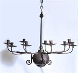 lot 118: Wrought Iron Nine Light Chandelier
 with scrolled terminals and three detachable arms 31" diameter, 26" high 18th century