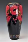 lot 142: Large Moorcroft Vase
 Pomegranate pattern 14 1/4" high with green script signature early 20th century