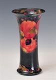 lot 146: Moorcroft Vase
 with flared rim Pomegranate pattern 8" high with green script signature early 20th century