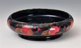 lot 147: Moorcroft Low Bowl
 with footed base Pomegranate pattern 11 3/8" diameter with green script signature early 20th century