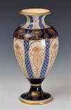 lot 153: William Moorcroft: MacIntyre Baluster Vase
 with Arts and Crafts motifs 12" high signed