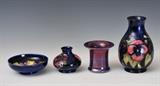 lot 156: Group of Four Moorcroft Vases
 the largest 6 1/4" high all signed