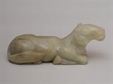 Lot 202: Chinese Jade Figure of a Horse
 recumbent with tail wrapped around 5 1/8" long with label from Paul E. Manheim Collection