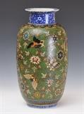 lot 207: Japanese Cloisonne on Porcelain Vase
 the body with stylized flowers and butterflies 17 3/4" high signed on base early 20th century