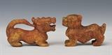 lot 214: Pair of Chinese Hard Stone Fu Dogs
 the largest 5 3/4" long