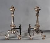 lot 334: Large Silver Plated Fireplace Set
 in the Baroque taste, consisting of 27" high andirons, fireplace tools and a matching screen circa 1920