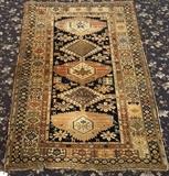 lot 310: Caucasian Carpet
 4' 1" x 6' circa 1900