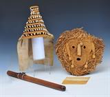 lot 252: Group of Tribal Objects
 including 12" corn husk mask with certificate from Columbian Exposition, Plateau baby cap with shells and flute, late 19th/early 20th century