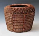 lot 322: American Coiled Basket
 14" diameter, 11" high circa 1900