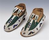 lot 247: Pair of Beaded Plains Moccasins
 10" long late 19th century