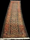 lot 308: North West Persian Carpet
 3' 2" x 14' early 20th century