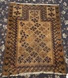 lot 312: Belouch Prayer Rug
 2' 9" x 3' 7" early 20th century