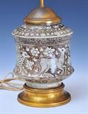 lot 259: Persian Faience Vase
 decorated with animals 8" high adapted to a lamp the base stamped Bensabott/ sterling