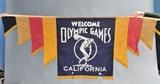 lot 275a: Two 1932 Los Angeles Olympic Banners
 34 1/2" x 54 1/2" flag and  35 1/2" x 96" banner