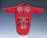 lot 252a: Tlingit Beaded Red Baby Tunic
 10" long late 19th/early 20th century