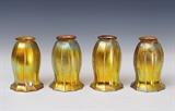  lot 320: Set of Four Art Glass Shades
 attributed to Steuben 6" high, 2 1/8" fitter early 20th century