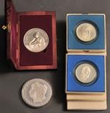 lot 352: Group Silver Collectible Medallions and Coins including six Balboa coins, 12 oz Panda, and 1995 8 oz medallion