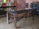 Chinese Chippendale style dining table with beveled glass top