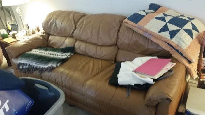 several couches and chairs, beds
