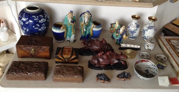 Asian items including blue & white ginger jar (no lid),  old carved wooden boxes (from India?), carved camphor jewelry box, Chinese "mud man" figurines, carved wooden water buffalo, pair of cloisonné vases & cloisonne smoking set, Japanese bowl with bunnies