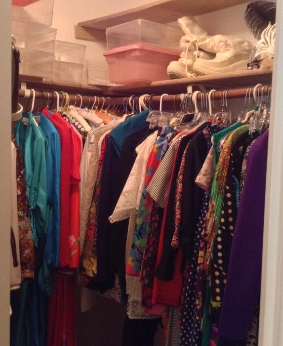 One of 3 closets full of ladies clothing - some vintage pieces (1950's - 80's) + newer pieces too.  Dresses, skirts, slips, 1980's jumpsuits, sweaters, ski wear (jackets & bibs), skating outfits & more.  Size small. Some great stuff for Halloween!