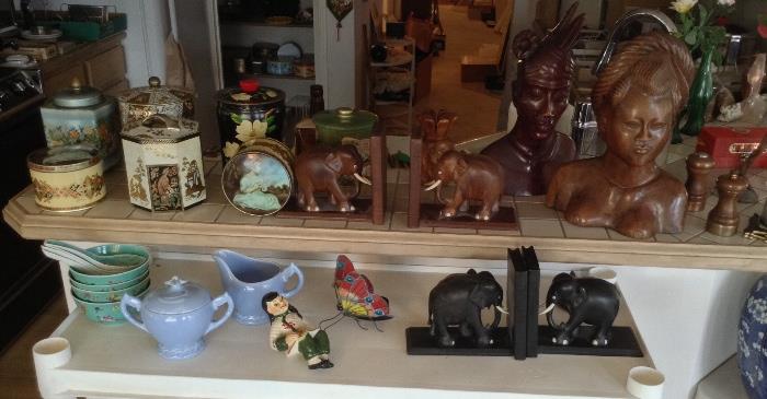 Vintage tins, carved wood bookends & busts, Asian bowls, Vernon Kilns pale blue creamer & sugar, Ceramic Arts Studio Asian girl "shelf sitter"