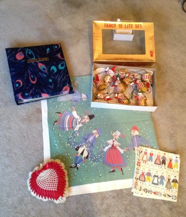 Scandinavian tablecloth & placemats, peacock photo album, vintage Twinkling Santa lights in original box (made in Japan)