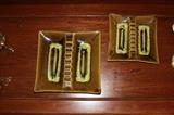 Matching green ashtrays