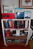 New old stock car stereo systems, cassette players, and speaker systems and signed books (fiction and nonfiction)