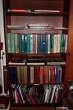 3 of 4 bookshelves dedicated to auto repair books and car manuals for GM, Ford, Chevrolet, and more