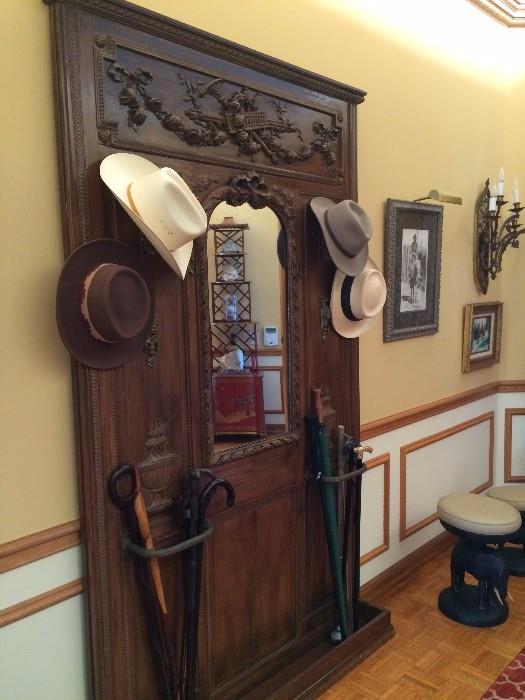   Wall mount hat and cane rack. Elephant stool.
