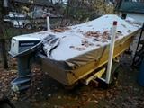 1984  14' aluminum smoker craft with 15 hp motor