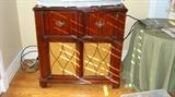 Old Radio Cabinet converted to a bar/storage cabinet