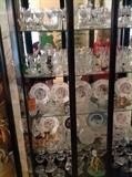 China cabinet. Filled with mostly Waterford, Lusmore pattern