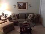 Beautiful sofa, two chairs and ottoman, coffee table