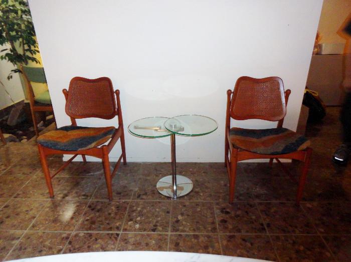 Pair of mcm side chairs with unusual Glass top swivel two glass top table