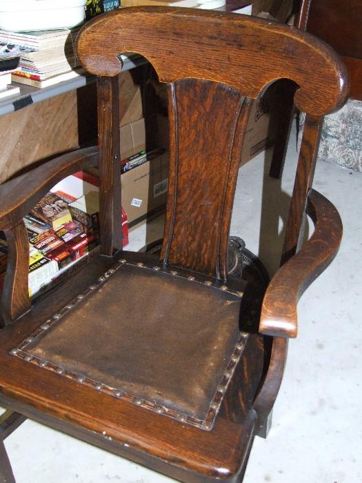 ANTIQUE OAK CHAIR WITH LEATHER SEAT...EXCELLENT CONDITION. ONLY ONE IS AVAILABLE
