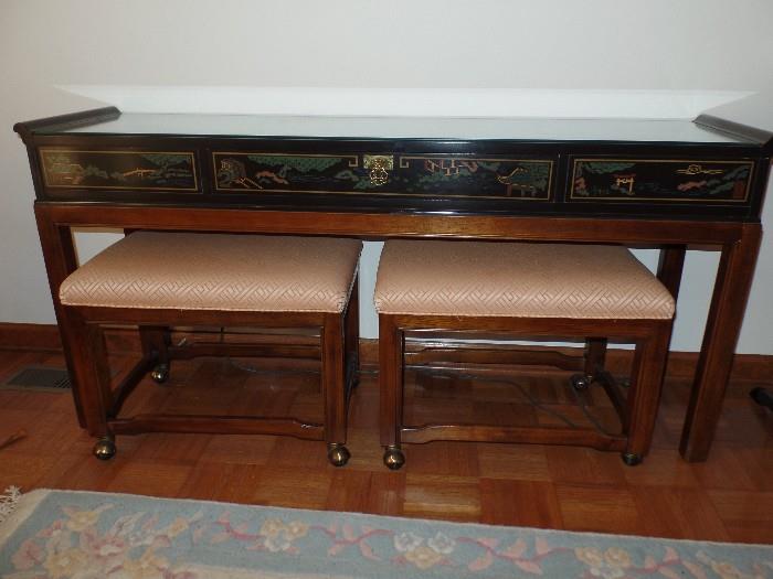 Oriental style hall table with two rolling stools