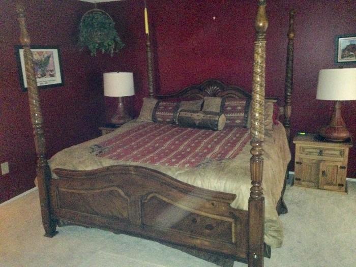 King 4-Poster Bed. 2 nightstands match an armoire and a credenza (the credenza served as a dresser here).