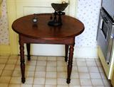 Antique turned-leg game table