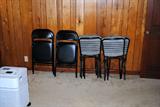 Two sets of nearly unused folding chairs