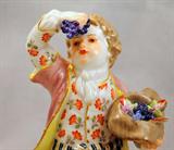 Meissen Porcelain Figurine, Boy Eating Grapes