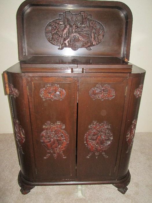 Antique Asian carved wine bar/chest