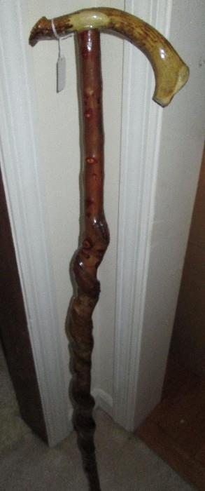 Twisted branch cane with antler handle