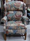 Awesome upholstered Queen Anne wing back chair w/books theme upholstery.