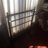 Brass towel/quilt holder