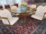 Dinette set - octagonal glass top on brass tone base and four chairs