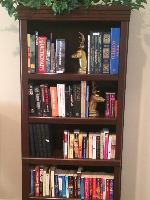 Bookcase and assorted books 